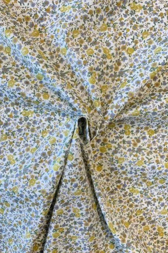 Katoen - Golden and Tiny Blue Flowers on White